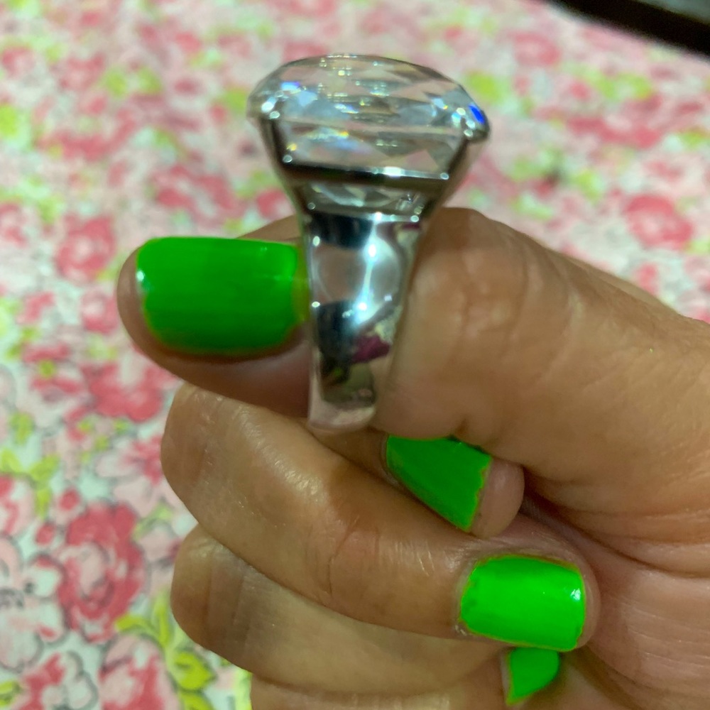 Swarovski ring fits like a 6 1/2 or 7